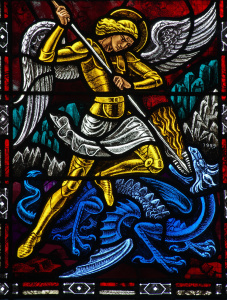 Angel Michael fighting a dragon