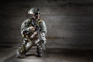 Soldier with mask rifle and backpack