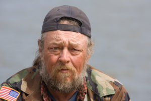 Portrait of homeless man with beard